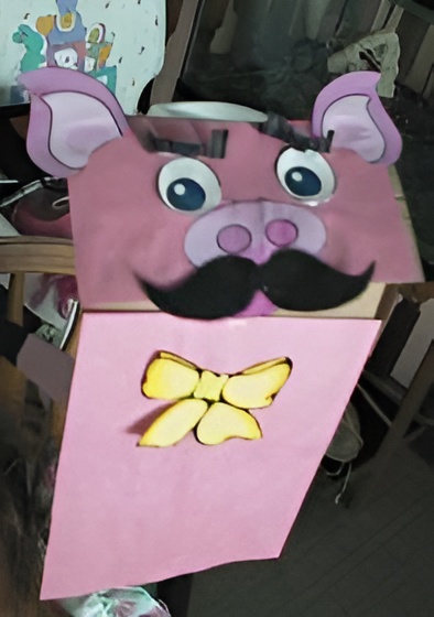 photo of the finished paper bag pig puppet